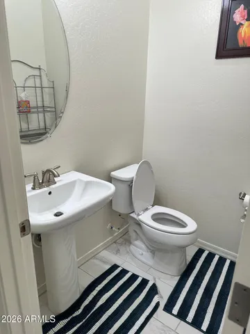 a view of a bedroom with a bed