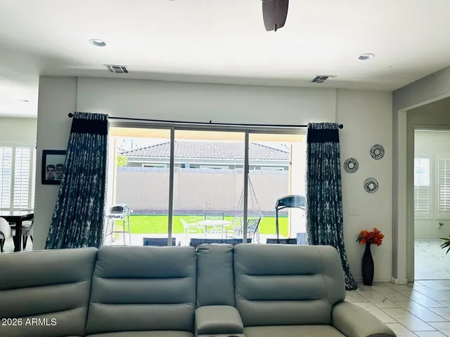 a living room with a couch and a table