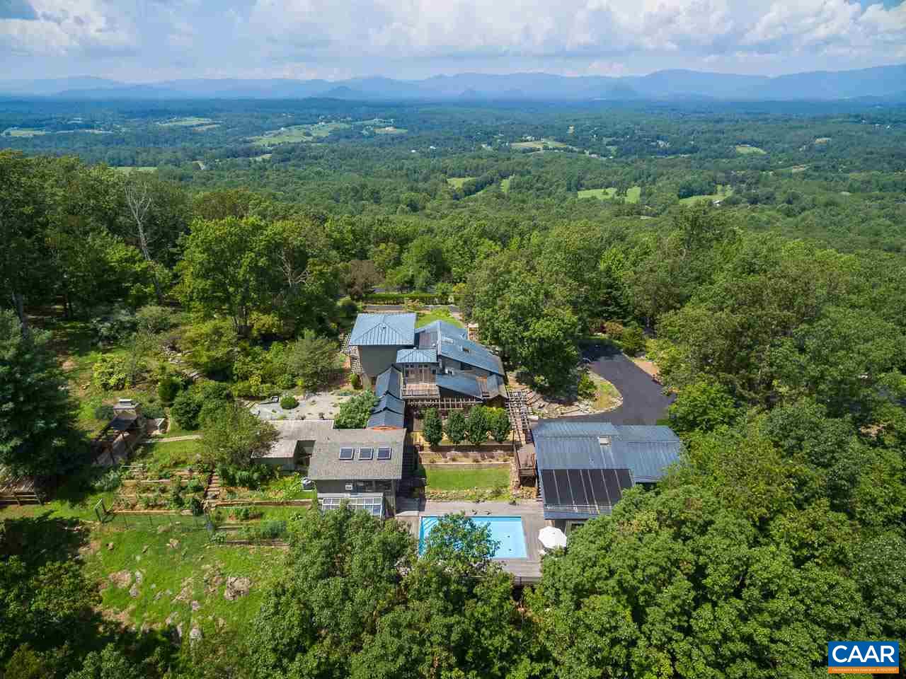 5400 Laurel Ridge Road Charlottesville, VA 22911 - Photo 1 of 49 an aerial view of a house with a yard