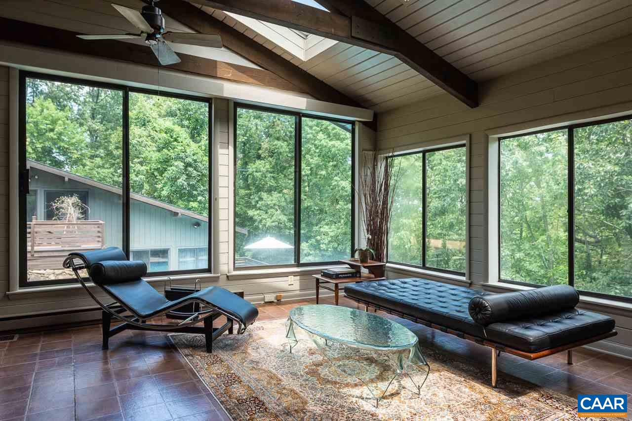 5400 Laurel Ridge Road Charlottesville, VA 22911 - Photo 36 of 49 a living room filed with furniture and a large window
