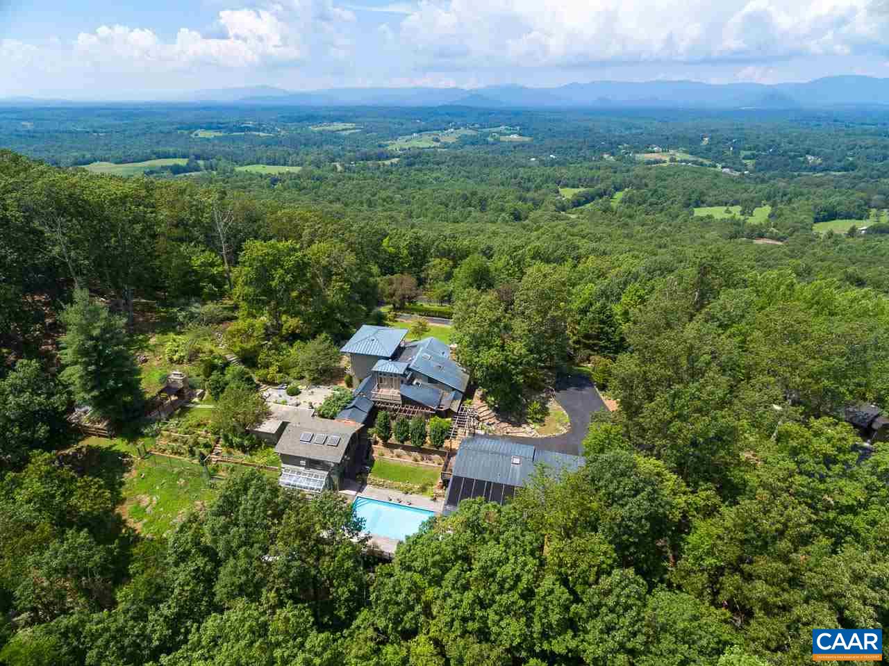 5400 Laurel Ridge Road Charlottesville, VA 22911 - Photo 47 of 49 a view of a city with lush green forest