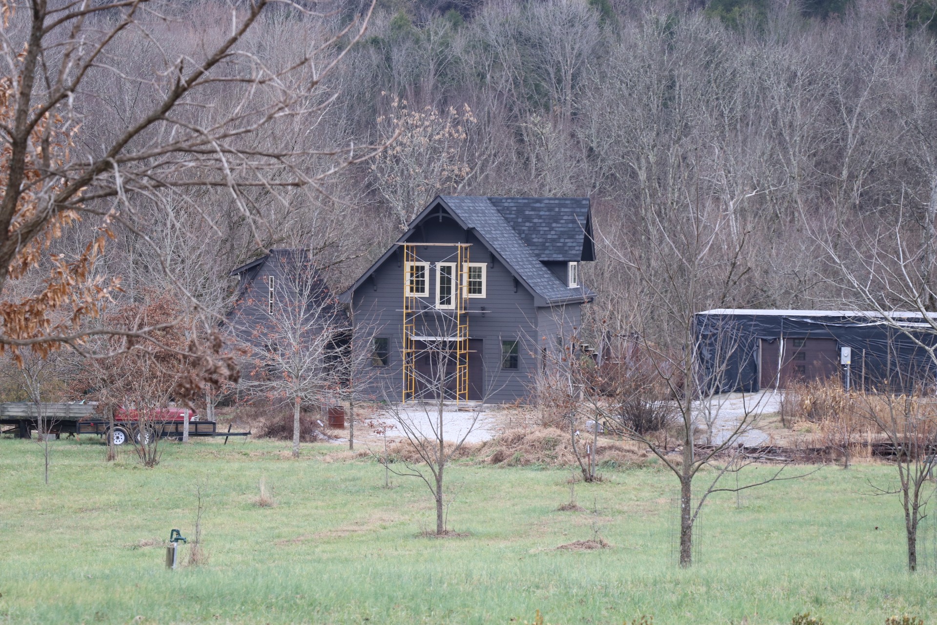 84 Judd Lane Lancaster, TN 38569 - Photo 2 of 33 a backyard of a house with table and chairs