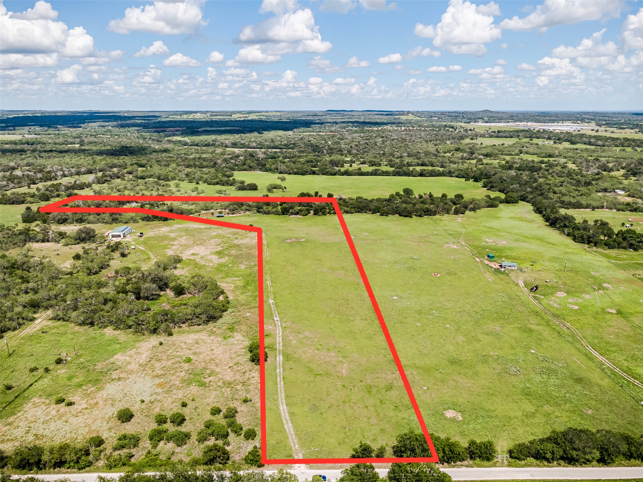 3109 Tenney Creek Road Dale, TX 78616 - Photo 14 of 23 Sprawling acreage offers a blend of wooded and open land for diverse uses.
