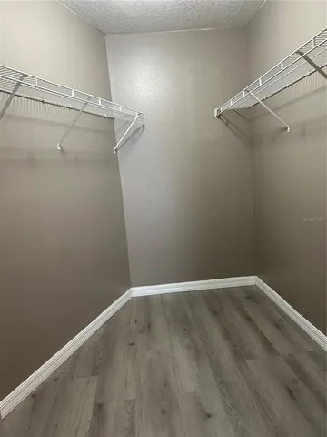 a view of a room with racks on the wall