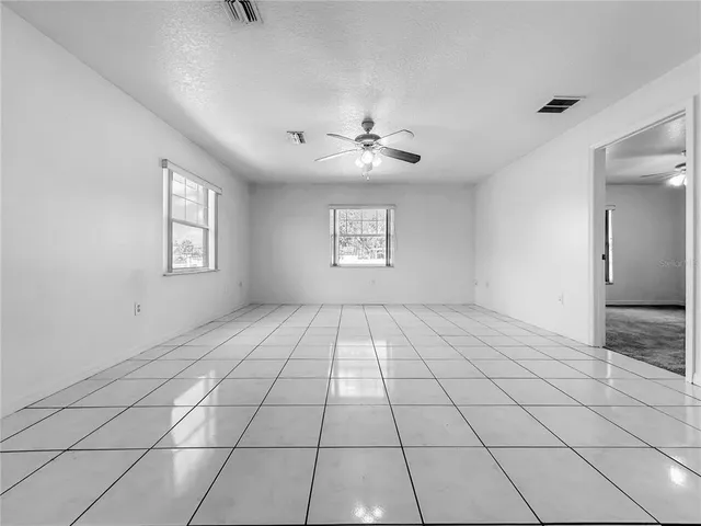 a view of an empty room and window