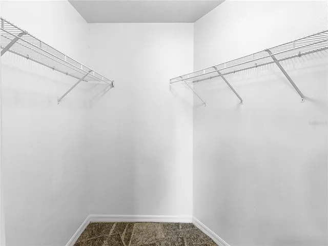 a view of a room with racks on the wall