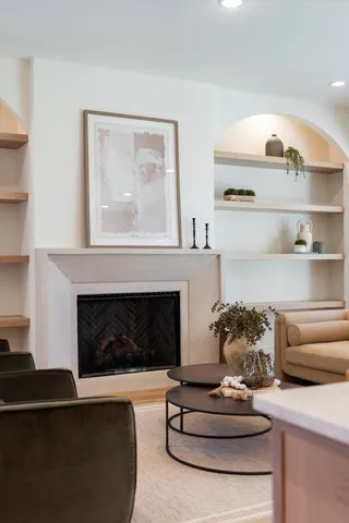 a kitchen with a sink cabinets and window