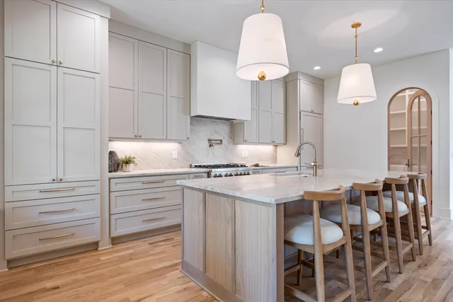 a view of cabinets with wooden floor