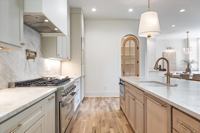an empty room with wooden floor and closet