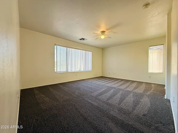 an empty room with windows
