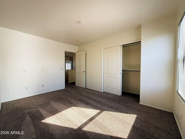 an empty room with closet