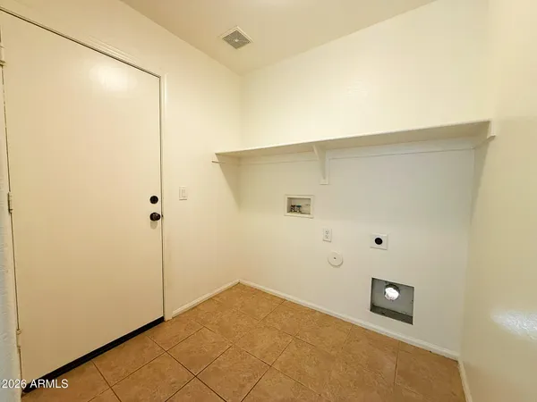 a view of a room with a door