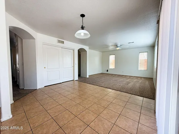 a view of an empty room and window