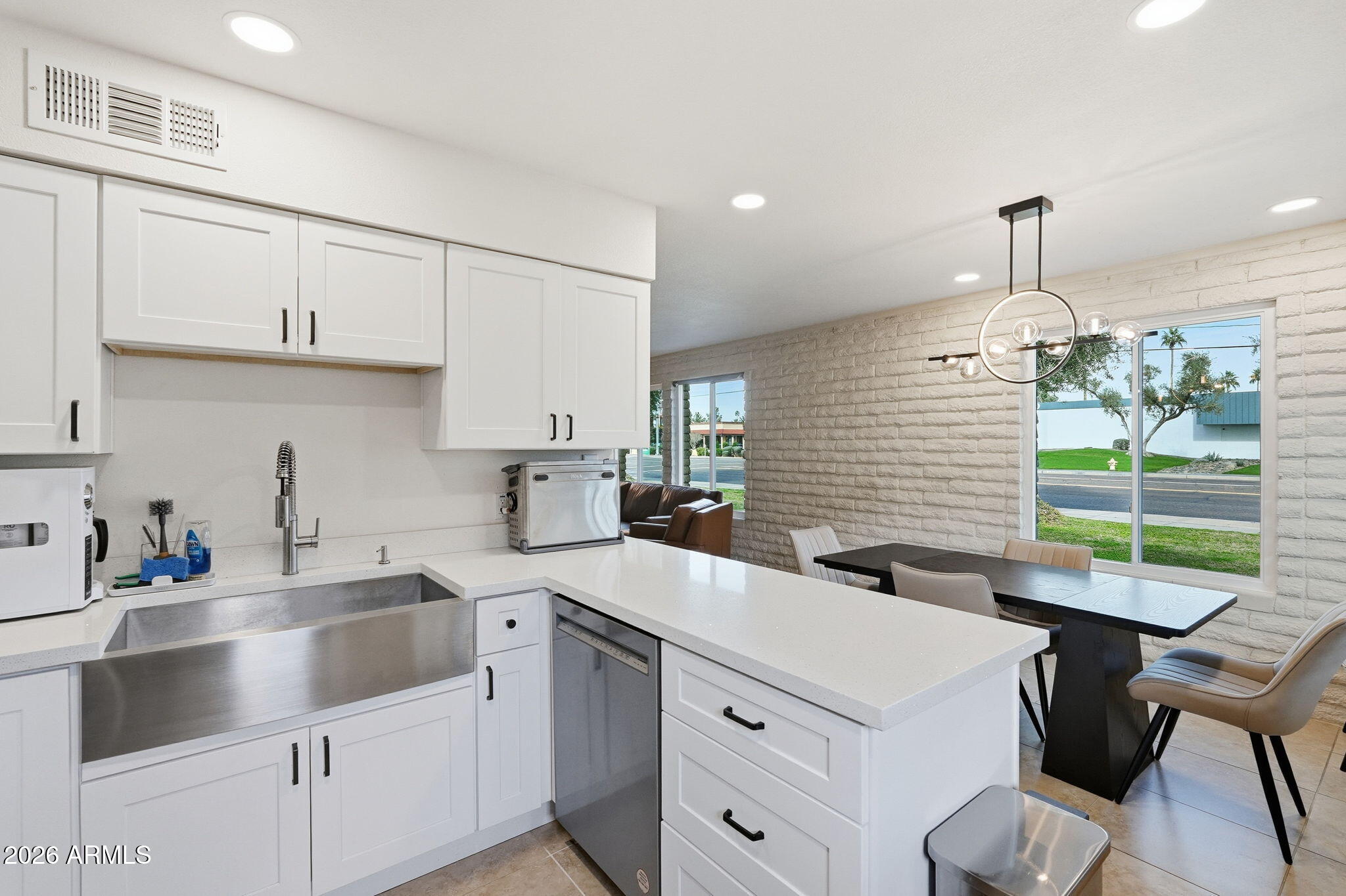 2015 East Southern Avenue, Unit 8 Tempe, AZ 85282 - Photo 14 of 33 a kitchen with a sink a window and cabinets