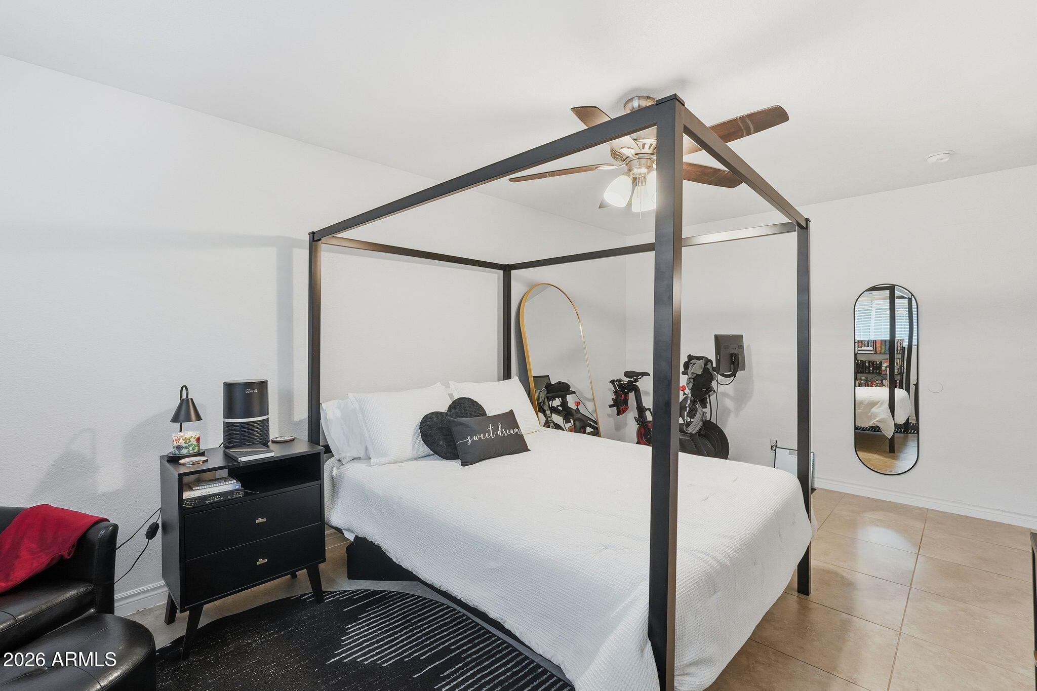 2015 East Southern Avenue, Unit 8 Tempe, AZ 85282 - Photo 24 of 33 a bedroom with a bed a mirror and dresser