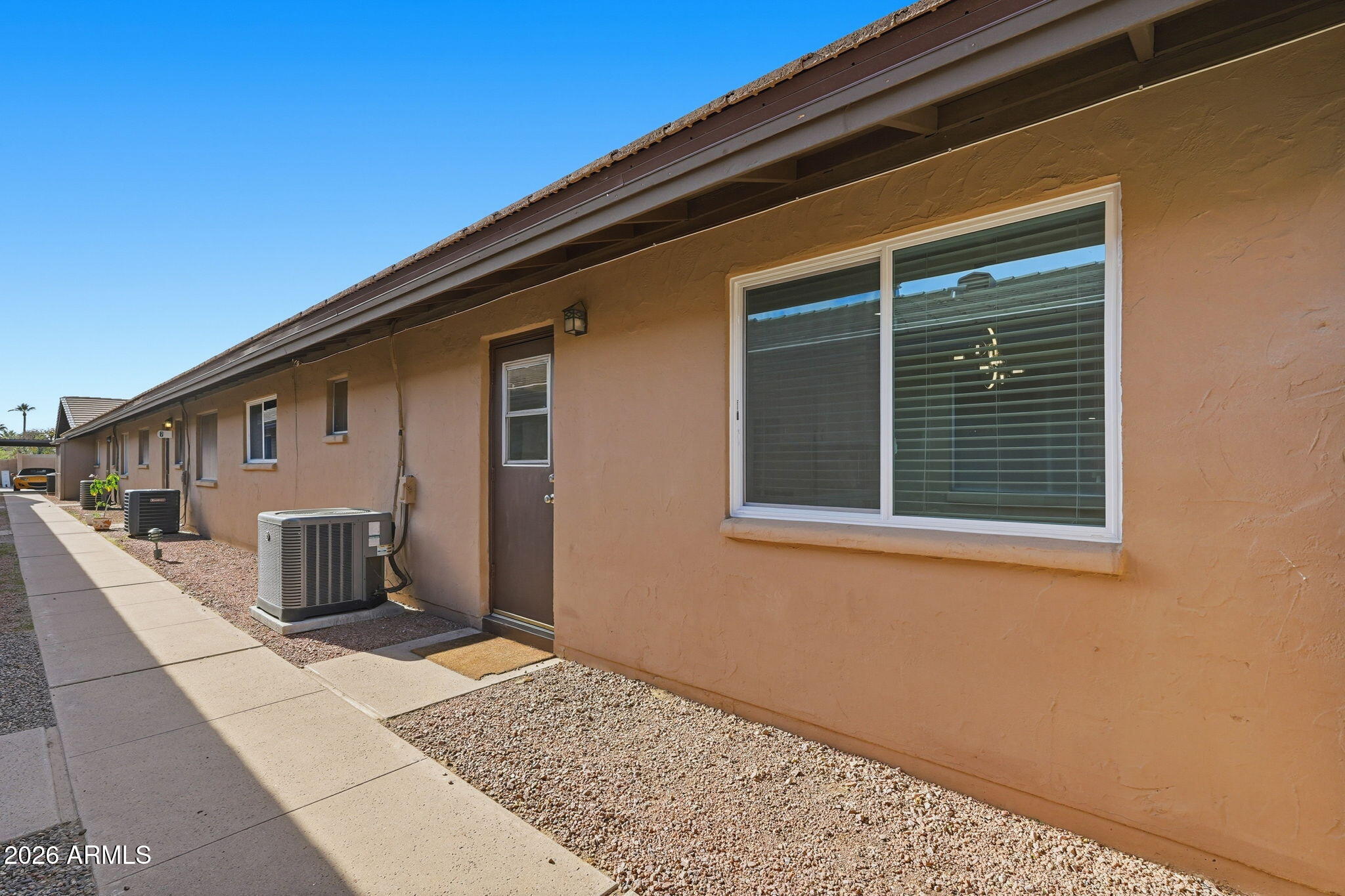 2015 East Southern Avenue, Unit 8 Tempe, AZ 85282 - Photo 32 of 33 a front view of a house with windows