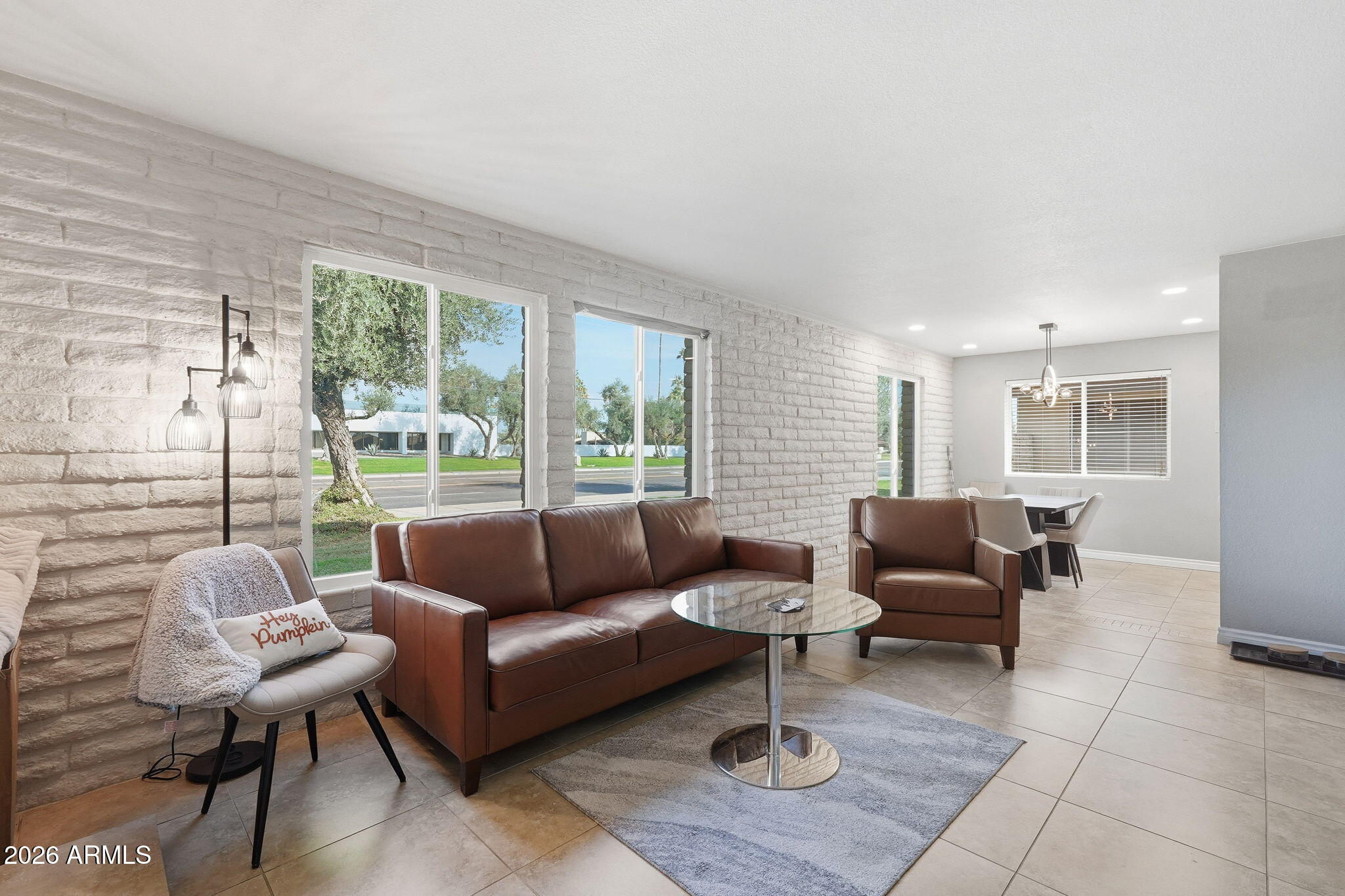 2015 East Southern Avenue, Unit 8 Tempe, AZ 85282 - Photo 5 of 33 a living room with furniture and a large window