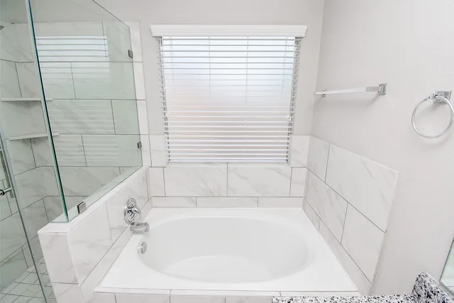 a bathroom with a bathtub