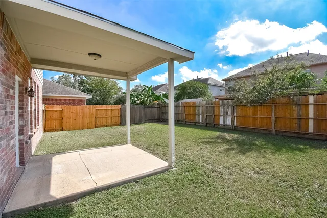 a view of a backyard with a garden