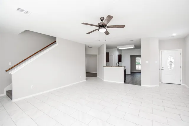 a view of a kitchen with a sink and cabinet area