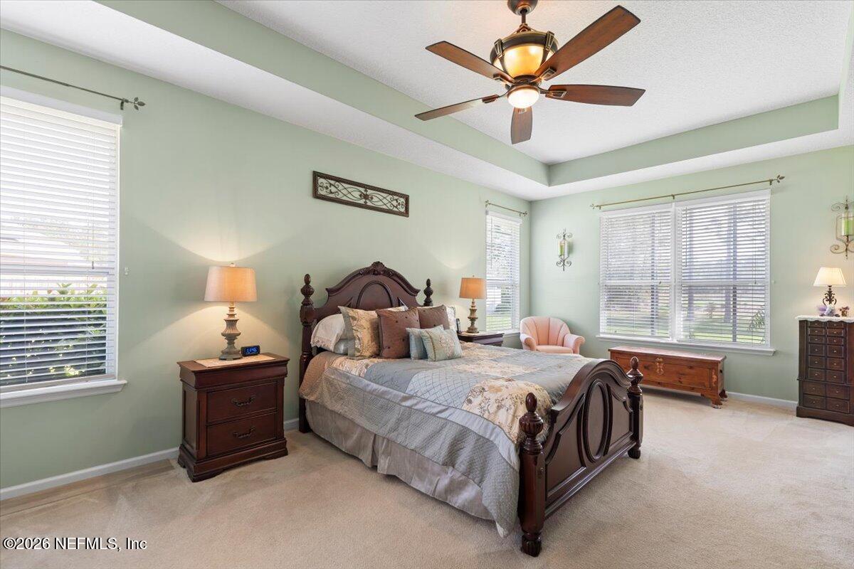 1112 Hawk Watch Circle St. Augustine, FL 32092 - Photo 38 of 49 a bedroom with a bed and window