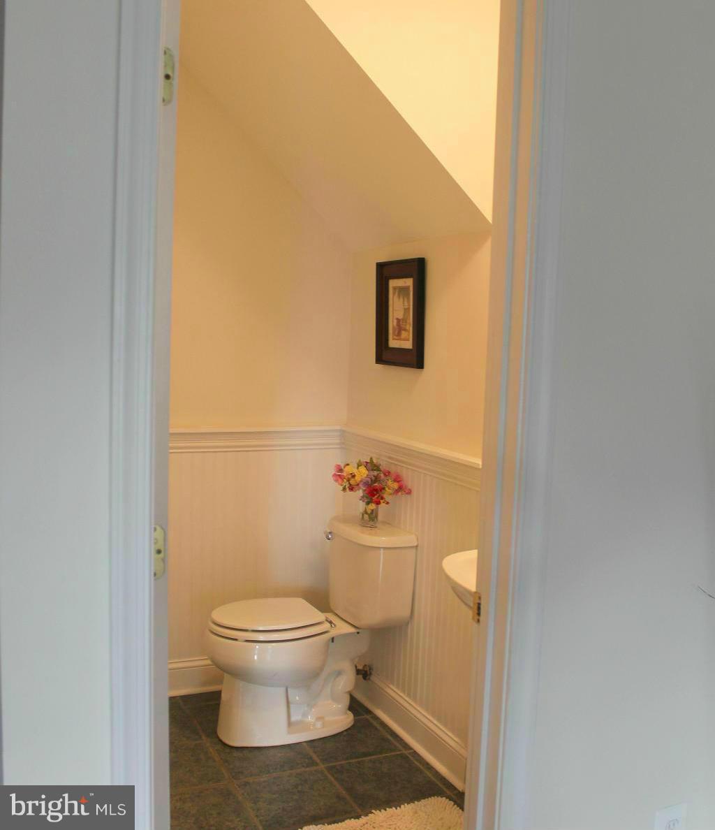 8728 Autumn Ridge Court Odenton, MD 21113 - Photo 7 of 26 HALF BATH ON THE MAIN LEVEL.