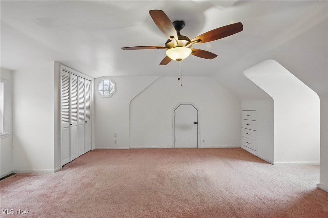 28575 White Road Wickliffe, OH 44092 - Photo 26 of 49 Bonus room with light carpet, baseboards, and a ceiling fan