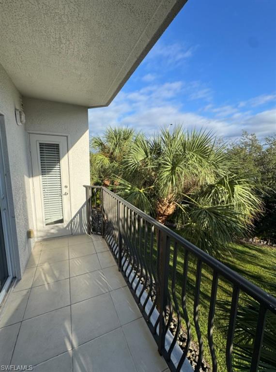 1100 Pine Ridge Road, Unit A302 Naples, FL 34108 - Photo 12 of 12 a view of a balcony