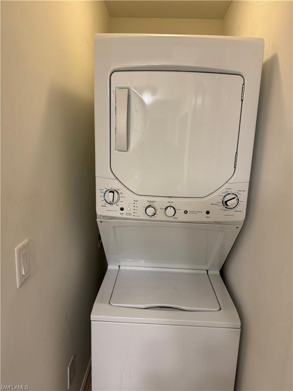 1100 Pine Ridge Road, Unit A302 Naples, FL 34108 - Photo 5 of 12 a view of washer and dryer