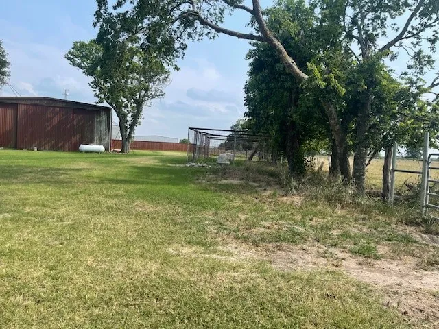 a fire hydrant in the middle of a field