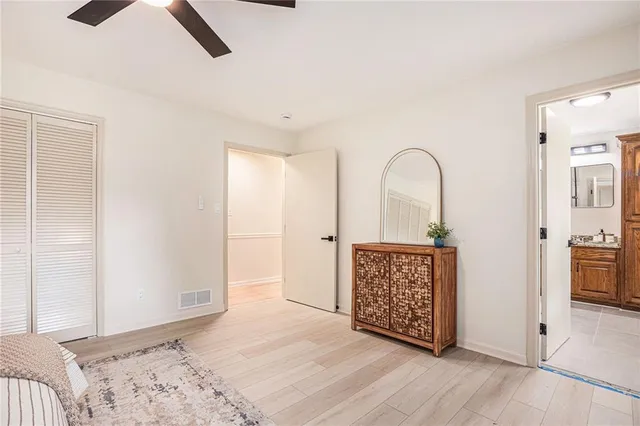 a view of room with window and wooden floor