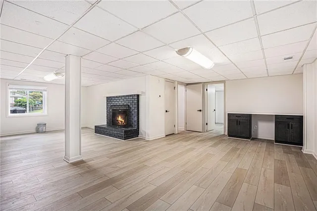 a view of a livingroom with wooden floor