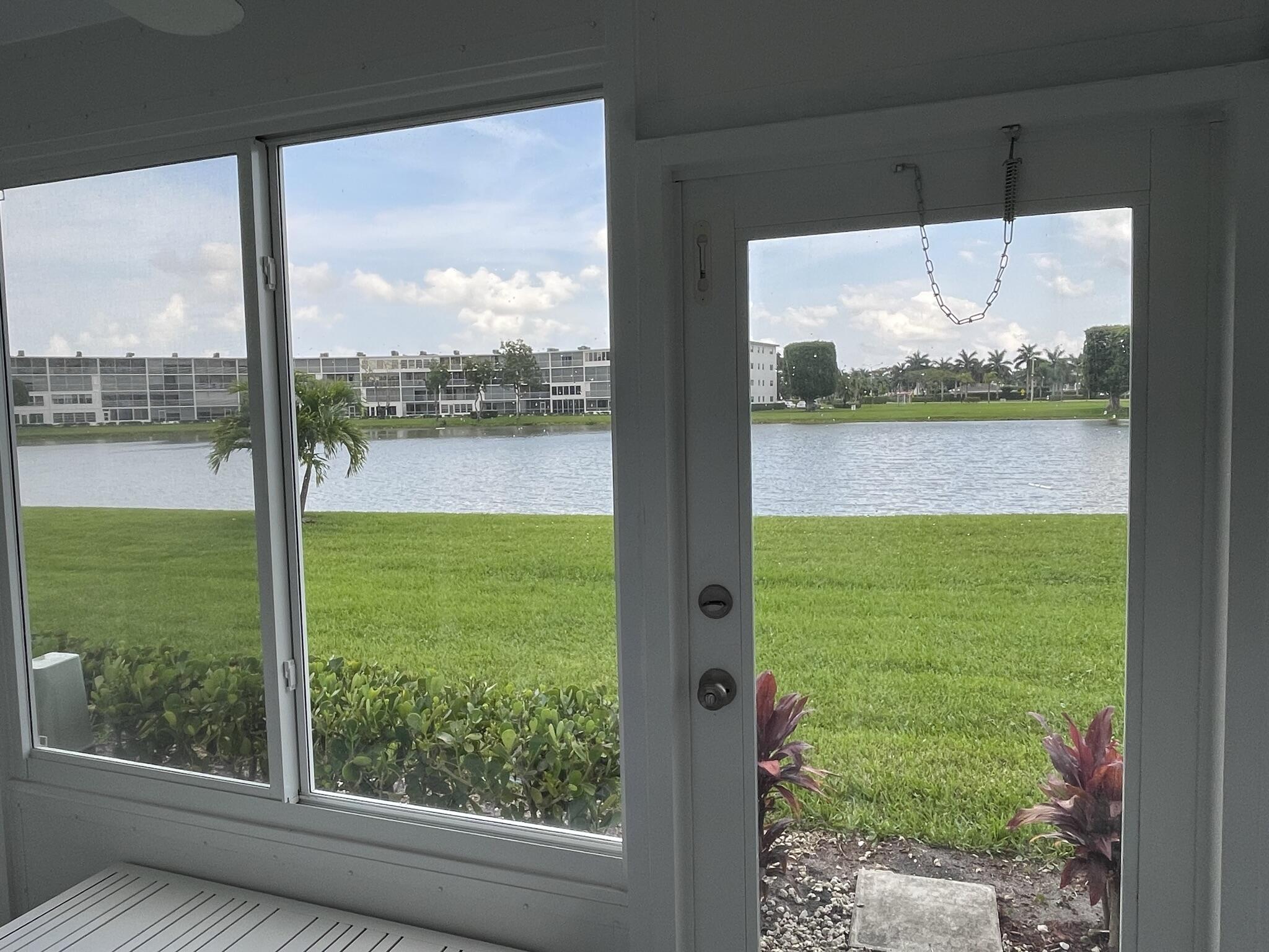 1014 Exeter Boca Raton, FL 33434 - Photo 18 of 31 a view of a lake from a living room