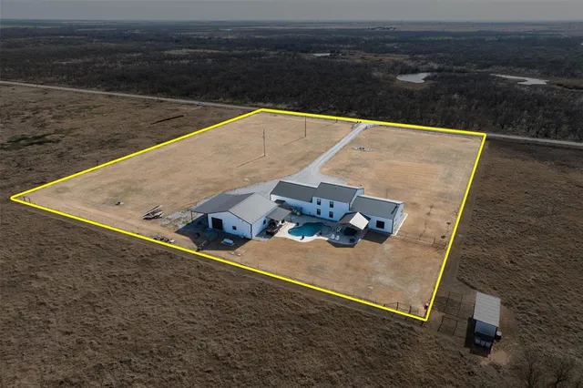 a view of a swimming pool with lounge chair