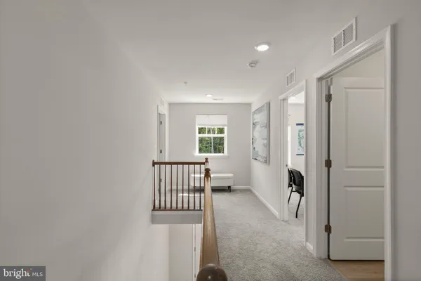 a view of entryway with livingroom