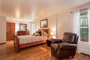 346 Phillips Road Sandwich, MA 02562 - Photo 12 of 16 a bedroom with furniture and wooden floor