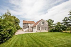 346 Phillips Road Sandwich, MA 02562 - Photo 6 of 16 a front view of a house with a yard