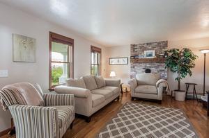 346 Phillips Road Sandwich, MA 02562 - Photo 8 of 16 a living room with furniture and a large window