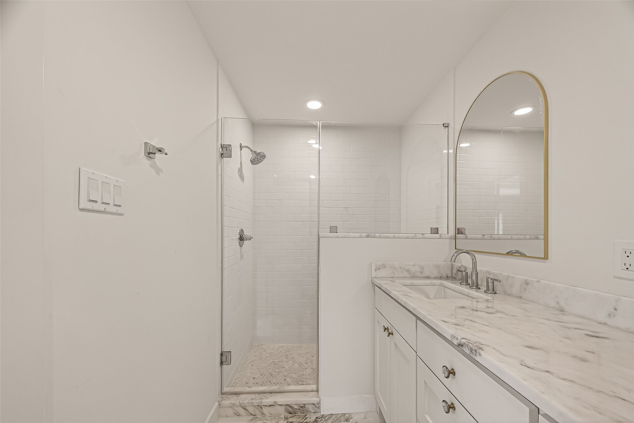 9242 Autauga Street Houston, TX 77080 - Photo 39 of 49 a bathroom with a granite countertop sink mirror and double