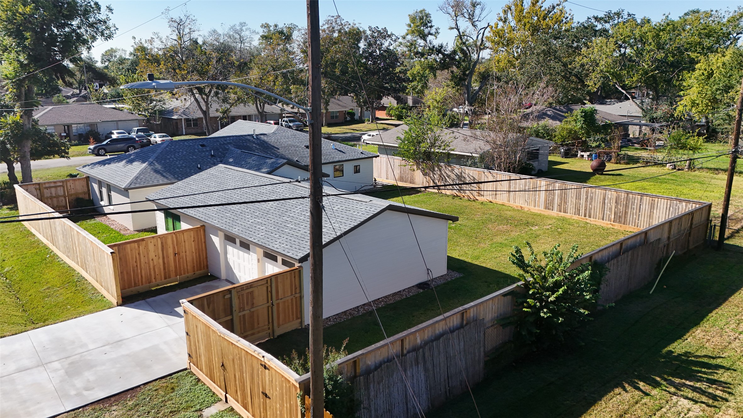 9242 Autauga Street Houston, TX 77080 - Photo 46 of 49 a view of a swimming pool with a patio