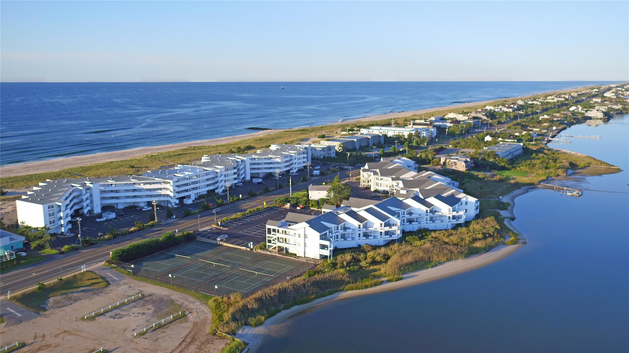 view of a balcony with an ocean