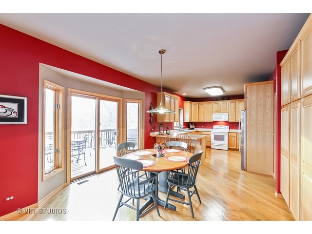 10808 West Riviera Drive Spring Grove, IL 60081 - Photo 5 of 16 a dining room with furniture and window