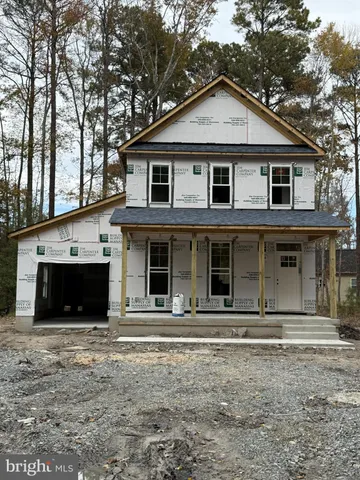 a front view of a house with windows