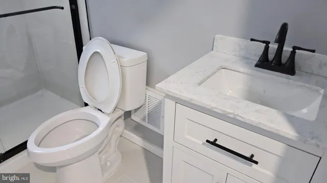 a view of a hallway with a washer and dryer
