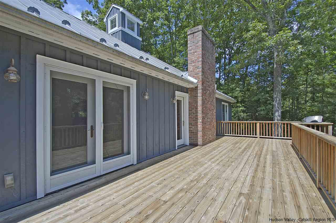 522 Buck Road Stone Ridge, NY 12484 - Photo 24 of 30 a view of backyard with deck and garden