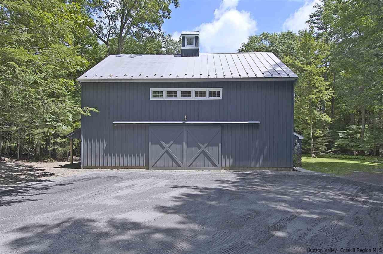 522 Buck Road Stone Ridge, NY 12484 - Photo 3 of 30 a front view of a house with a yard
