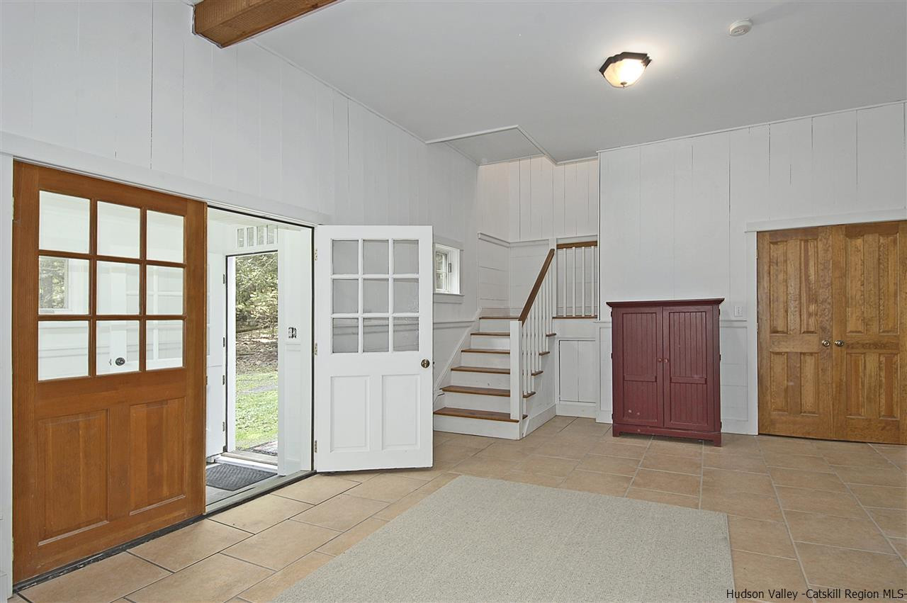 522 Buck Road Stone Ridge, NY 12484 - Photo 5 of 30 a view of an entryway with stairs
