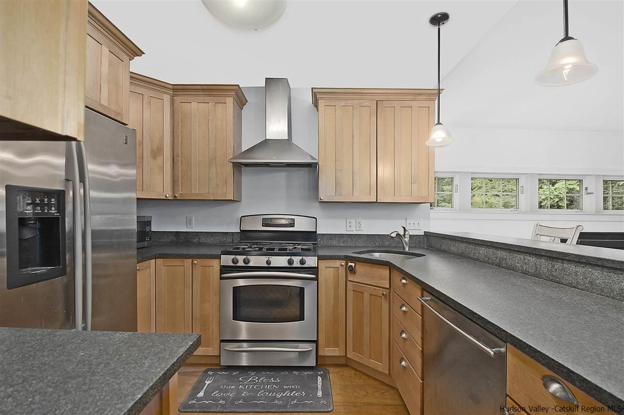 522 Buck Road Stone Ridge, NY 12484 - Photo 8 of 30 a kitchen with a stove and a sink