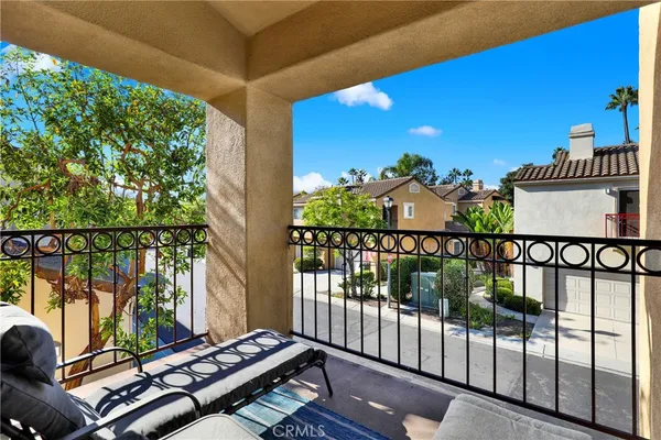 a view of balcony with wooden floor
