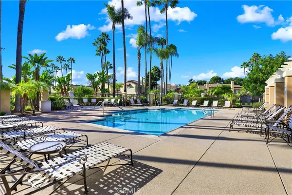a view of a swimming pool with a sitting space